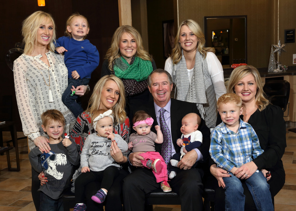 Doug Cole posts for photos with Cole's Salon staff and their families!